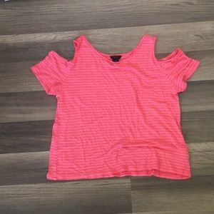 Striped shirt with cutouts in the sleeve area